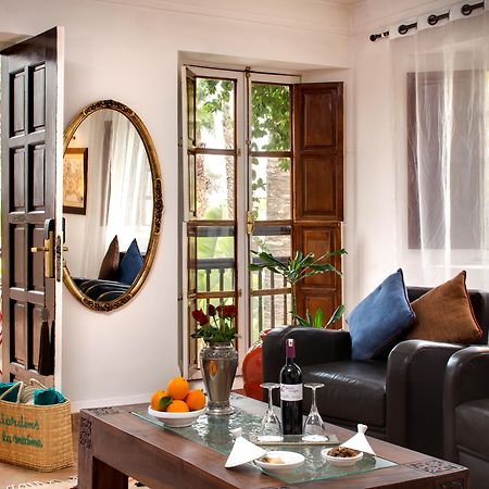 ホテル レ ヤルディン デ ラ メディナ マラケシュ エクステリア 写真 A living room in a typical apartment